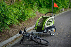 Przyczepka rowerowa z amortyzatorem 2-osobowa +JOGGER zielona + gratis