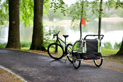 Przyczepka rowerowa z amortyzatorem 2-osobowa +JOGGER zielona + gratis